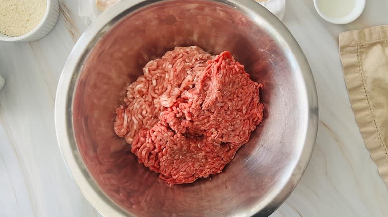 ground beef in metal bowl