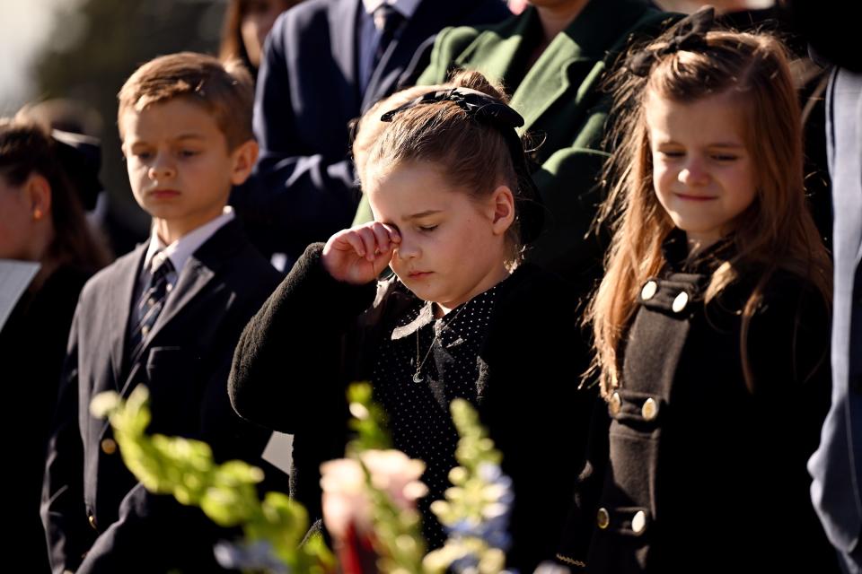 Young family members listen to President M. Russell Ballard’s graveside service in the Salt Lake City Cemetery on Friday, Nov. 17, 2023. | Scott G Winterton, Deseret News