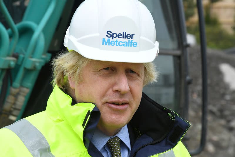 Britain's Prime Minister Boris Johnson visits the Speller Metcalfe's building site in Dudley