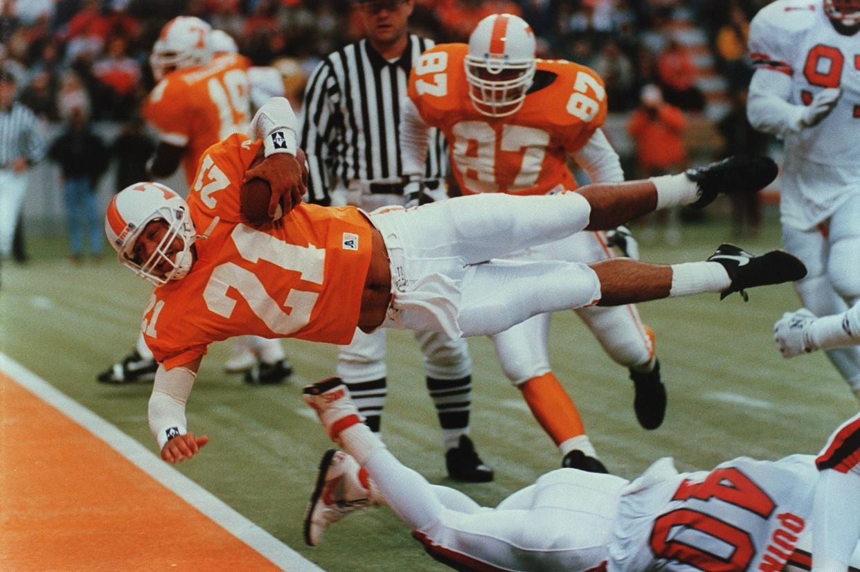 Heath Shuler rushed for 383 yards as a Tennessee quarterback including this 6-yard touchdown run against Louisville on Nov. 6, 1993. (Paul Efird/News Sentinel)