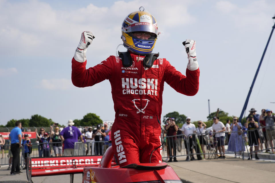 Marcus Ericsson, of Sweden, celebrates winning the first race of the IndyCar Detroit Grand Prix auto racing doubleheader on Belle Isle in Detroit Saturday, June 12, 2021. (AP Photo/Paul Sancya)