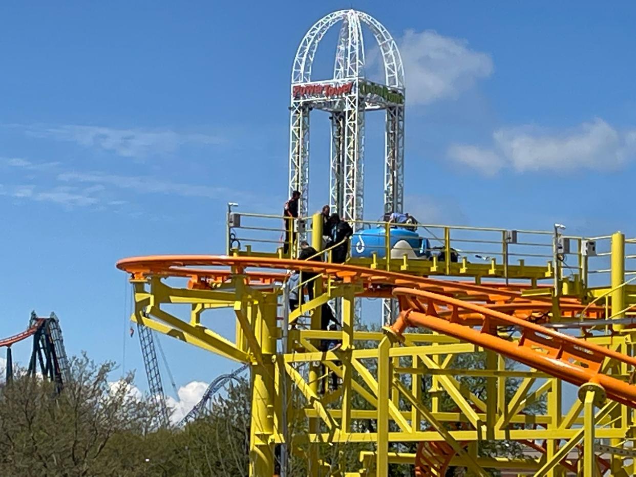 Passengers on Cedar Point's new Wild Mouse roller coaster had to be escorted off the ride Thursday after it abruptly stopped mid cycle during a preview for roller coaster enthusiasts and the media.