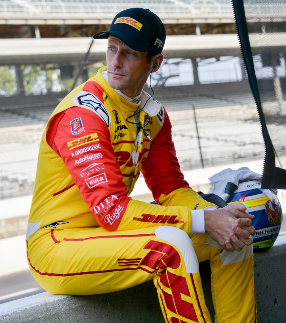 Andretti Autosport driver Romain Grosjean (28) looks out from his pit box Friday, Aug. 11, 2023, during practice for the Gallagher Grand Prix at Indianapolis Motor Speedway.