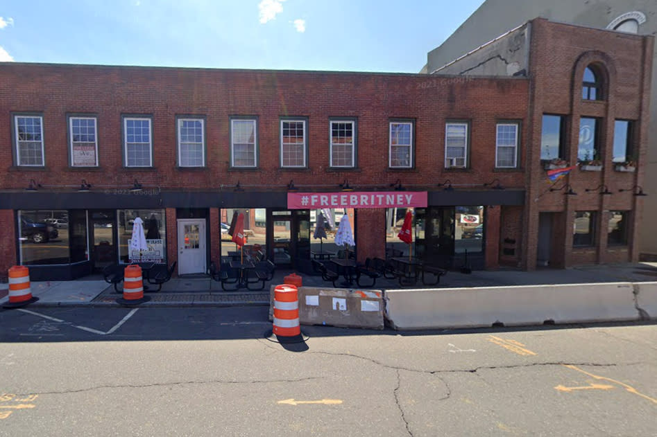 A #FreeBritney banner hangs outside Troupe429, a gay bar in Norwalk, Conn. (Google Maps)