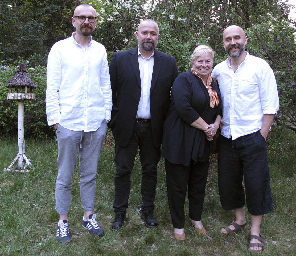 In this photo taken May 1, 2019, from left, activists, Konrad Korzeniowski, Michał Wojcieszczuk, abuse survivor Barbara Borowiecka, and activist Rafał Suszek, pose for a photo. A documentary film with testimony by victims of clerical abuse in Poland is so harrowing that it has forced an unprecedented reckoning with the problem in one of Europe’s most deeply Catholic societies. (AP Photo/Marta A. Hallay-Suszek)