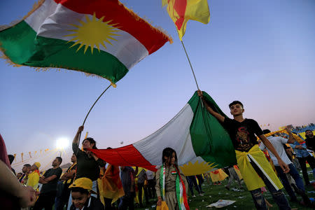 FILE PHOTO: Supporters of former Iraqi Kurdistan regional president Masoud Barzani gather ahead of regional elections in Duhok, Iraq September 27, 2018. REUTERS/Ari Jalal/File Photo