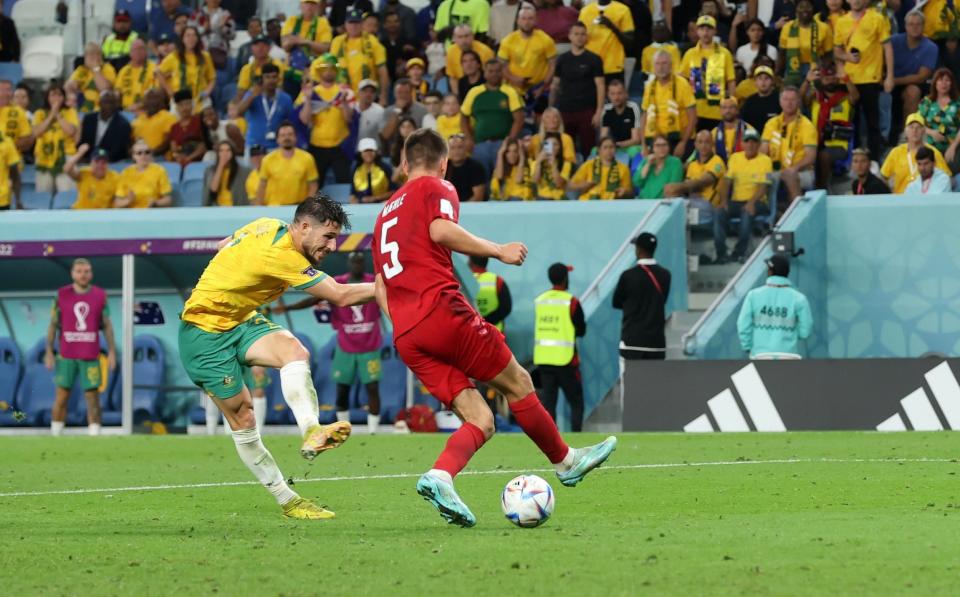 Mathew Leckie of Australia scores their team's first goal during the FIFA World Cup Qatar 2022 Group D match between Australia and Denmark at Al Janoub Stadium - Alex Grimm/Getty Images