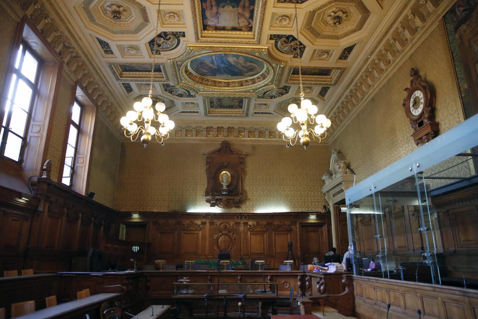 General view of the court room where eight people are going on trial in relation to a bungled terrorist plot against Notre Dame Cathedral, in Paris, Monday, Sept. 23, 2019. The key suspects are two French women who pledged allegiance to the Islamic State group. They allegedly tried to explode a vehicle laden with fuel-doused gas canisters in the shadow of the medieval monument in 2016. (AP Photo/Francois Mori)