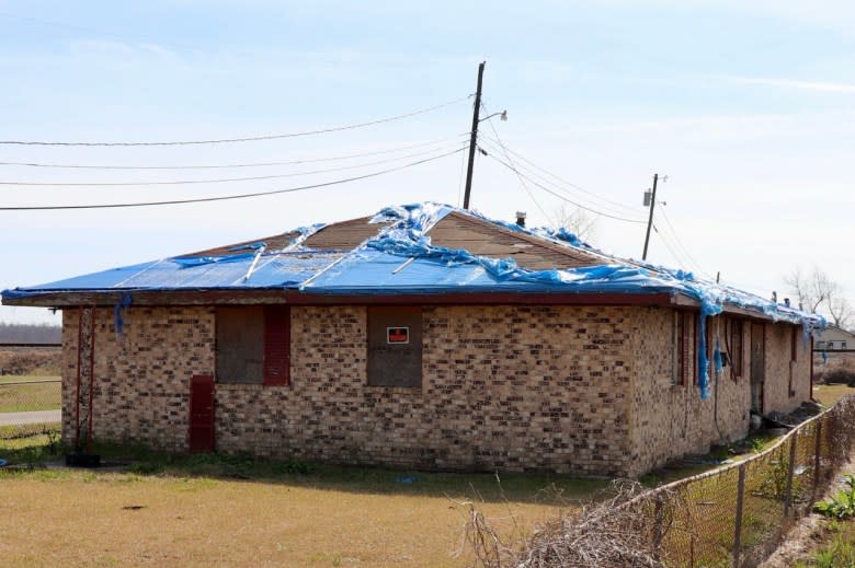 An abandoned house sits in Edgard, Louisiana. Many storm victims say it’s difficult to recover because of the limited money they received from FEMA. (Adam Mahoney/Capital B)