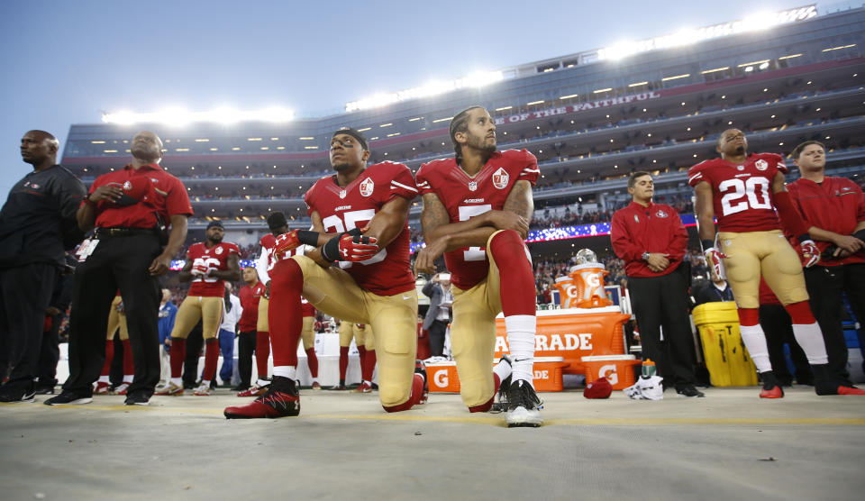 SANTA CLARA, CA - SEPTEMBER 12: Eric Reid #35 and Colin Kaepernick #7 of the San Francisco 49ers kneel during the anthem, prior to the game against the Los Angeles Rams at Levi Stadium on September 12, 2016 in Santa Clara, California. The 49ers defeated the Rams 28-0. (Photo by Michael Zagaris/San Francisco 49ers/Getty Images) 