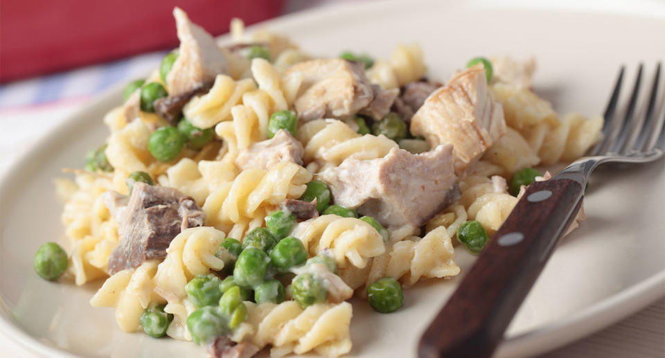 A plate of tuna pasta bake with peas. Image: Getty