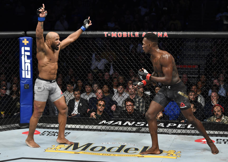 LAS VEGAS, NEVADA - MARCH 07: (L-R) Yoel Romero of Cuba taunts Israel Adesanya of Nigeria in their UFC middleweight championship fight during the UFC 248 event at T-Mobile Arena on March 07, 2020 in Las Vegas, Nevada. (Photo by Jeff Bottari/Zuffa LLC)