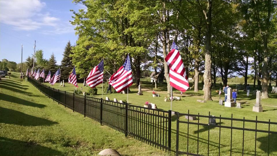American flags are seen at Lakeside Cemetery in Norwood Township on Memorial Day.