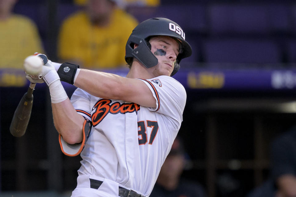 FILE - Oregon State infielder Travis Bazzana (37) bats during an NCAA baseball game on Friday, June 2, 2023, in Baton Rouge, La. The second baseman from Australia rides momentum into the season. (AP Photo/Matthew Hinton, File)