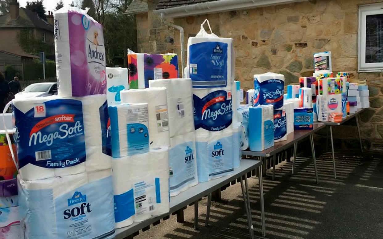 Tables covered in donations of school essentials which were gifted to St John's Primary School in Crowborough, East Sussex - © SWNS.com