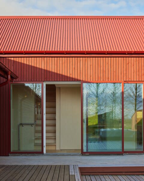 "One of the main problems with the house before was that you were a little isolated, it was hard to get out to the environment," says Gylfir. Doors and windows galore solve that problem in the renovated home. 