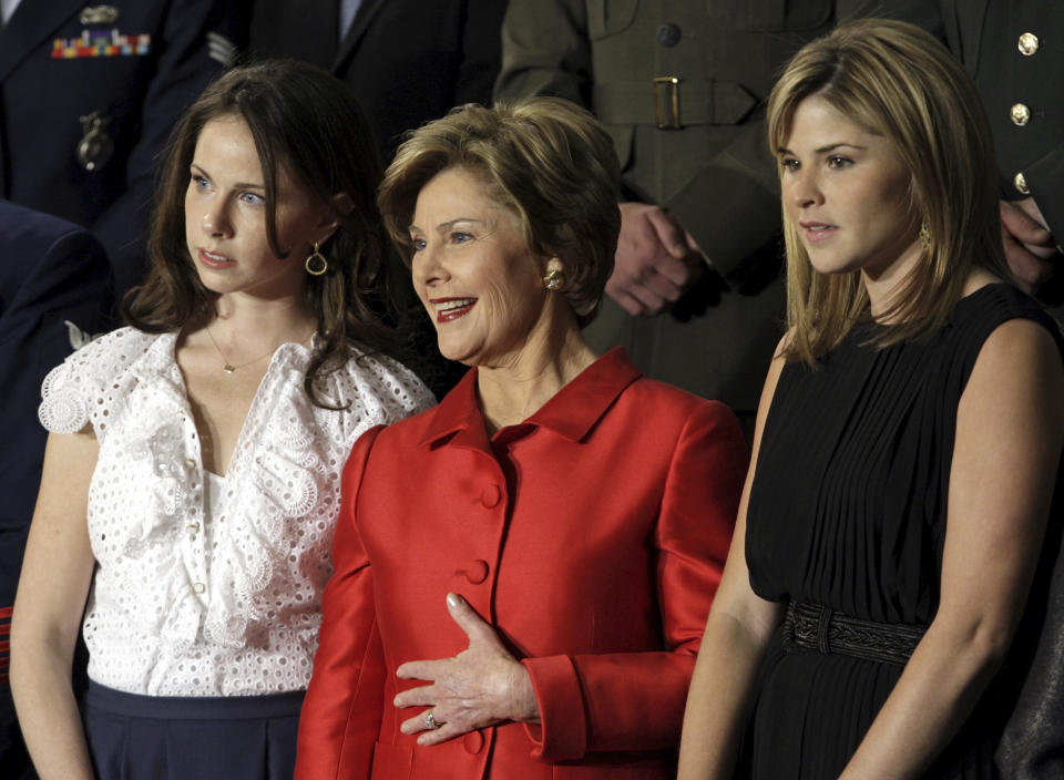 FILE - First lady Laura Bush, center, accompanied by daughters Barbara Bush, left, and Jenna Bush, right, attend President George W. Bush's State of the Union address before a joint session of Congress, Jan. 28, 2008, on Capitol Hill in Washington. (AP Photo/Ron Edmonds, File)