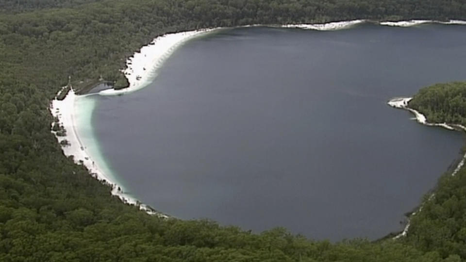 This image made from video shows Lake McKenzie in Queensland, Australia, Saturday, March 30, 2019. Two Japanese teenagers was found dead in the lake on Saturday morning after being reported missing from a school tour. (Australian Broadcasting Corporation via AP)