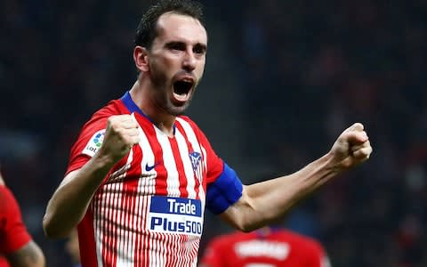 Atletico Madrid's Diego Godin celebrates scoring their third goal - Credit: REUTERS