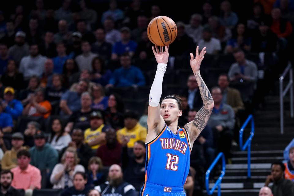 Oklahoma City forward Lindy Waters III (12) shoots for three in the second quarter of an NBA game between the Oklahoma City Thunder and the Los Angeles Lakers at the Paycom Center in Oklahoma City on Wednesday, March 1, 2023. 