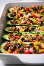 <p>More meat. Less carbs.</p><p>Get the <a href="https://www.delish.com/uk/cooking/recipes/a30312055/burrito-zucchini-boats-recipe/" rel="nofollow noopener" target="_blank" data-ylk="slk:Burrito Courgette Boats;elm:context_link;itc:0;sec:content-canvas" class="link ">Burrito Courgette Boats</a> recipe.</p>