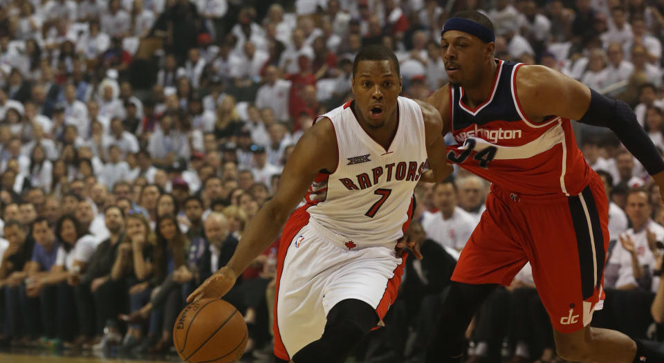 Kyle Lowry and Paul Pierce battle during playoff action between the Toronto Raptors and Washington Wizards in 2015. (Rick Madonik/Toronto Star via Getty Images)