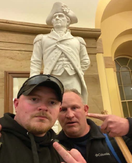 Police officers Jacob Fracker and Thomas Robertson took a selfie inside the U.S. Capitol during an insurrection. (Photo: U.S. District Court)