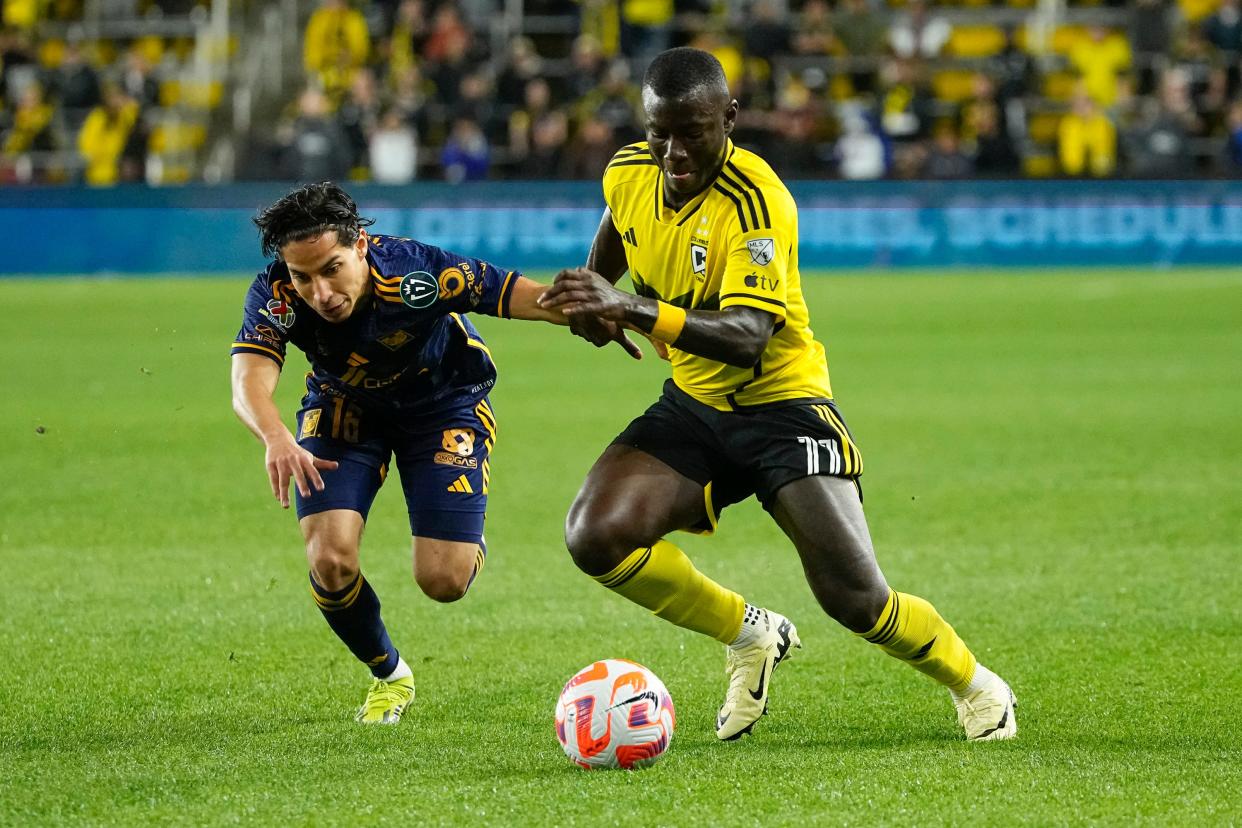 Apr 2, 2024; Columbus, OH, USA; Columbus Crew midfielder Marino Hinestroza (11) battles with Tigres UANL midfielder Diego Lainez (16) during the second half of the Concacaf Champions Cup quarterfinal at Lower.com Field. The game ended in a 1-1 tie. Mandatory Credit: Adam Cairns-USA TODAY Sports