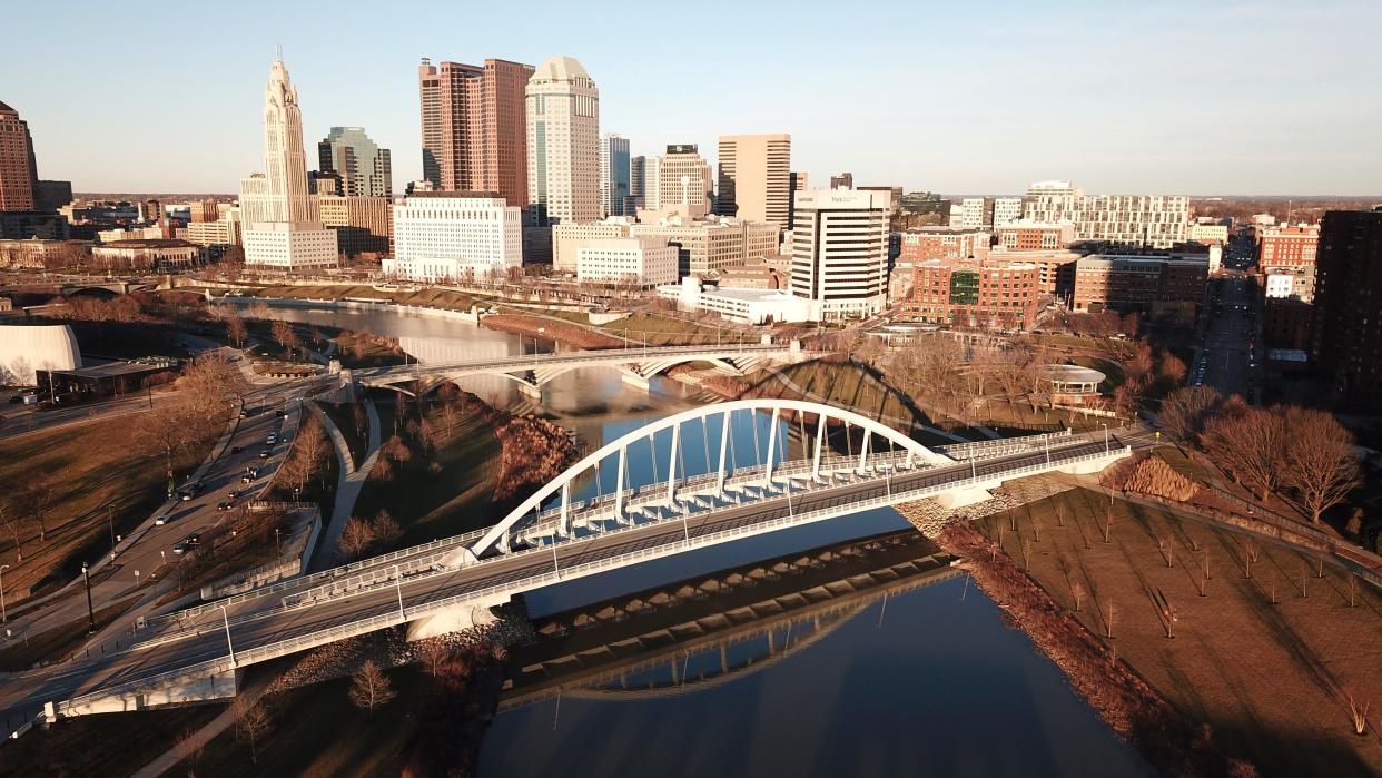 Feb 12, 2023; Columbus, Ohio, USA; Sunshine illuminates the Main St. bridge and the downtown Columbus Skyline on Sunday, Feb. 12, 2023. Mandatory Credit: Doral Chenoweth-The Columbus Dispatch