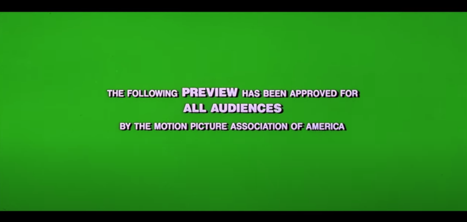 The green screen before a movie trailer starts, text says, "The following preview has been approved for all audiences by the Motion Picture Association of America"