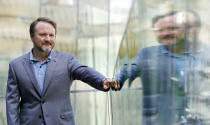 Rian Johnson, writer/director of "Glass Onion: A Knives Out Mystery," poses for a portrait during the 2022 Toronto International Film Festival, Saturday, Sept. 10 2022, at the Shangri-La Hotel in Toronto. (AP Photo/Chris Pizzello)