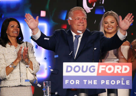 Progressive Conservative (PC) leader Doug Ford attends his election night party with his wife Karla Ford (L) and their daughters following the provincial election in Toronto, Ontario, Canada, June 7, 2018. REUTERS/Carlo Allegri