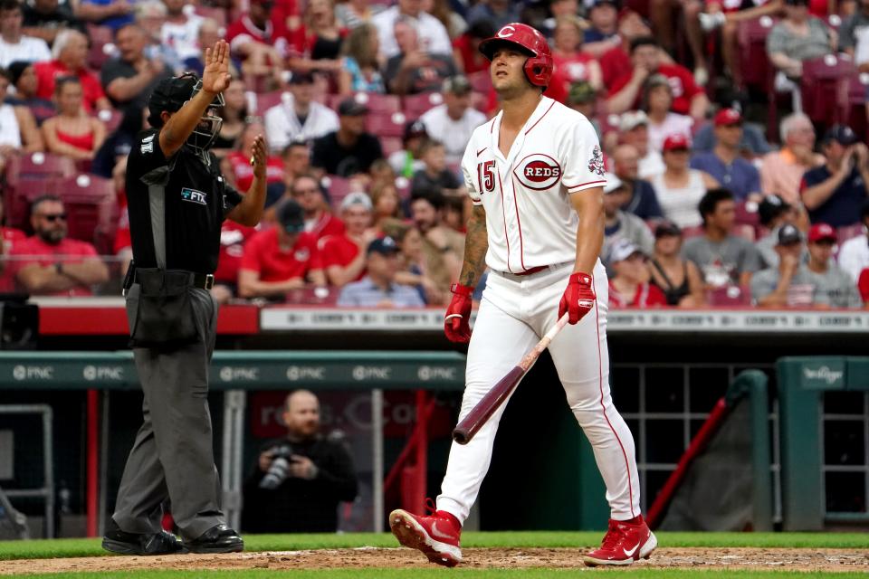 Cincinnati Reds center fielder Nick Senzel (15) reacts after striking out during the fifth inning of a baseball game against the Atlanta Braves, Friday, July 1, 2022, at Great American Ball Park in Cincinnati. The Atlanta Braves won, 9-1. 