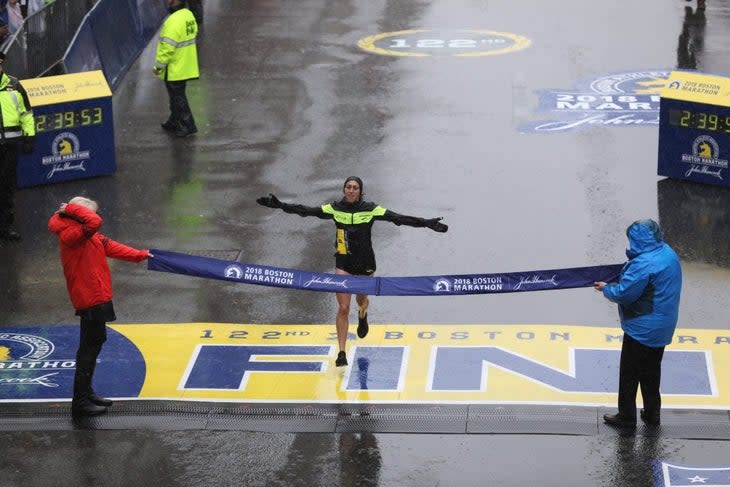 Desiree Linden crosses the finish line at the 2018 Boston Marathon, the first American woman to place first in 33 years.