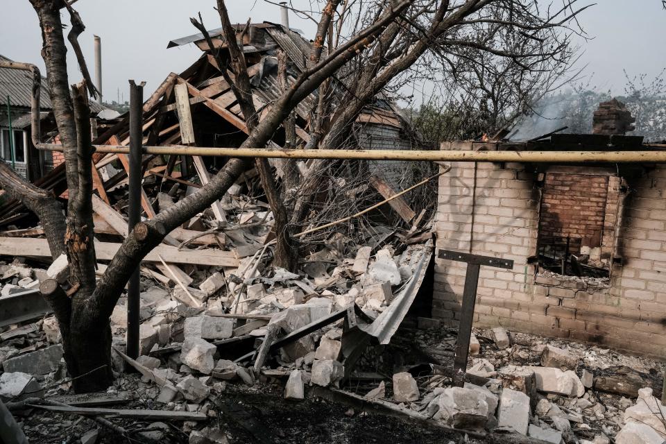 The remains of a destroyed home following the shelling of the village of Bilogorivka, Lugansk region, eastern Ukraine, is pictured on May 13, 2022. - On May 8, 2022, Ukranian President Volodymyr Zelensky said that sixty civilians died in the bombing of a school in Bilogorivka, eastern Ukraine's Lugansk region. Russia invaed Ukraine on February 24, 2022. (Photo by Yasuyoshi CHIBA / AFP) (Photo by YASUYOSHI CHIBA/AFP via Getty Images)