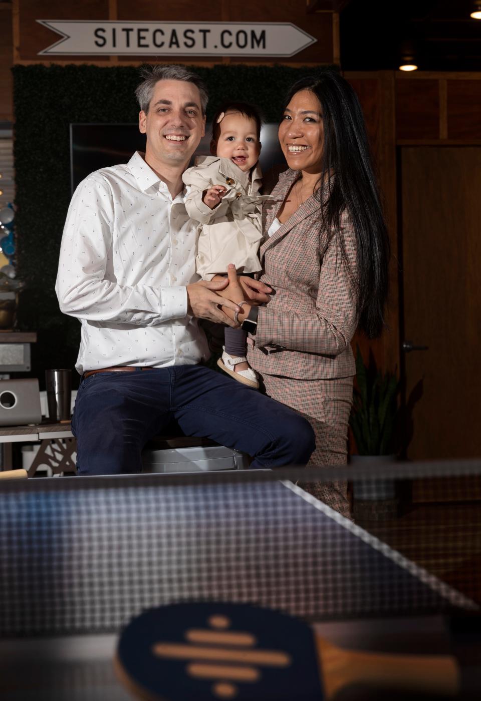 Brad and Rubie Gauthier are shown with their 10-month-old daughter in Minocqua.  They are the owners of Sitecast, a national website design firm. They lived in Portland,  but anxious about coronavirus and social unrest, left the city and moved to the Northwoods.