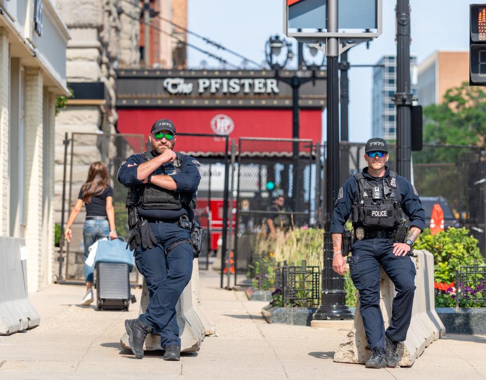 Police officials are seen outside the security perimeter of The Pfister Hotel on North Milwaukee Street as the 2024 Republican National Convention commences on Monday July 15, 2024, in Milwaukee, Wisconsin.