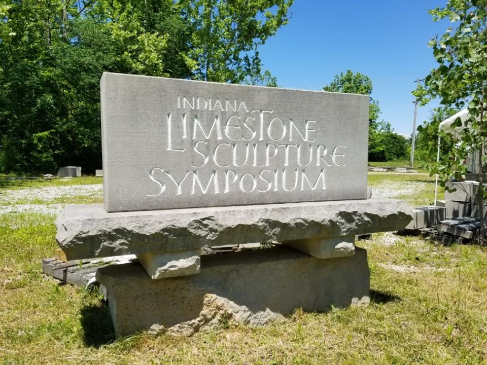 Artist and youth teacher Janey Westin carved the Indiana Limestone Symposium sign.