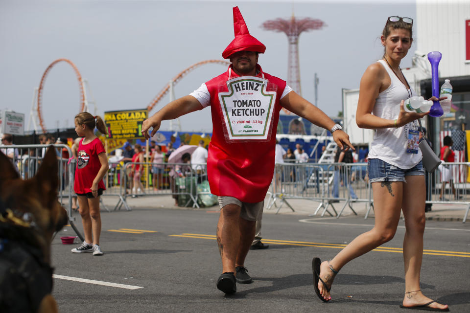 A guy dressed up like ketchup.