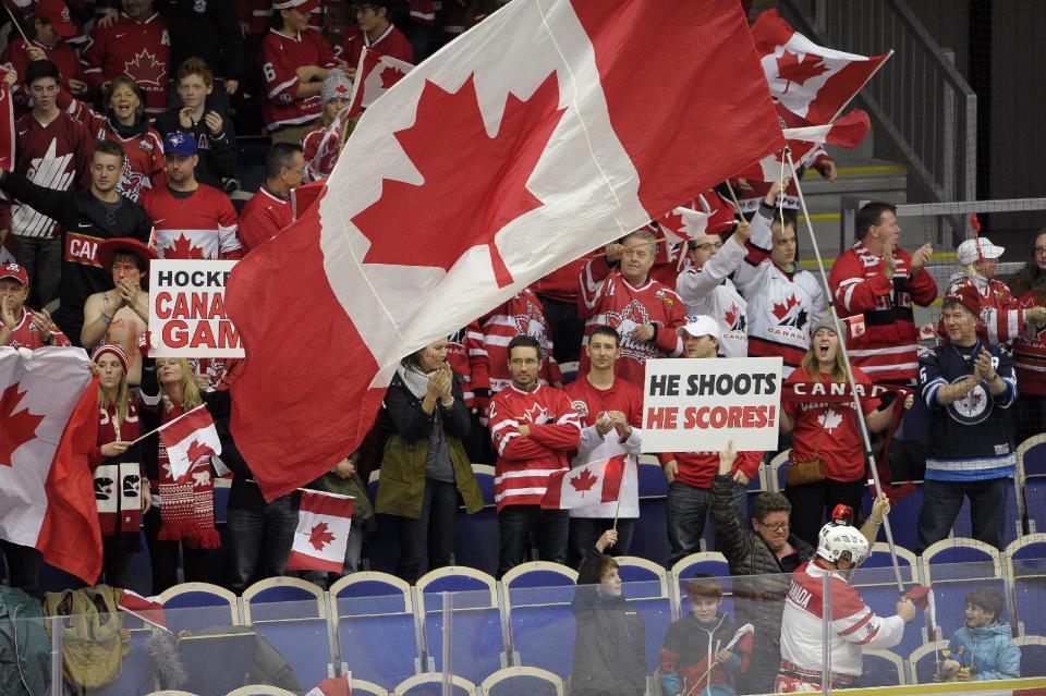 Canada supporters in the stands during the World Junior Hockey Championships quarterfinal between Canada and Switzerland at the Malmo Stadium in Malmo, Sweden on Thursday, Jan. 2, 2014. Canada won the match 4-1 and go forward to the semifinal on Saturday. (AP Photo / TT News Agency / Bjorn Lindgren) SWEDEN OUT