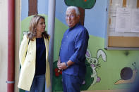 Portuguese Prime Minister and Socialist Party leader Antonio Costa and his wife Fernanda Tadeu leave a polling station after voting in Lisbon Sunday, Oct. 6, 2019. Portugal is holding a general election Sunday in which voters will choose members of the next Portuguese parliament. (AP Photo/Armando Franca)