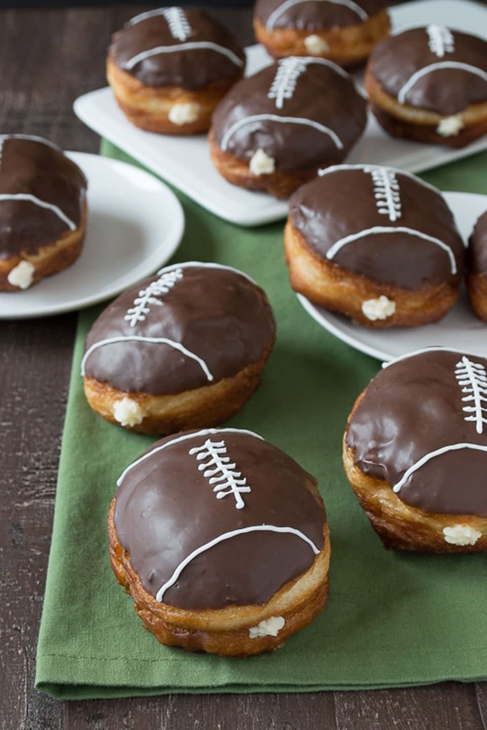 Cream-Filled Chocolate Football Donuts