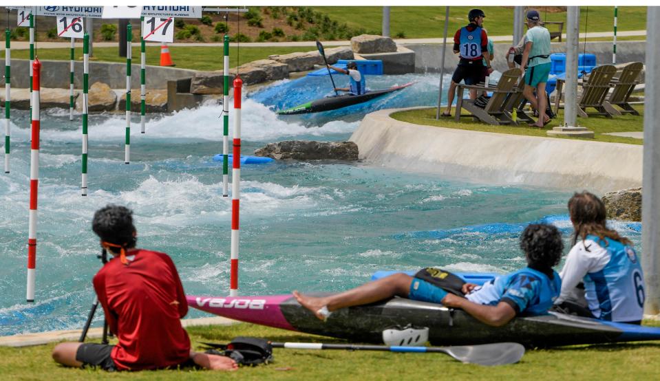 Competitors compete in Canoe Slolom Age Group Nationals as Montgomery Whitewater holds its grand opening weekend in Montgomery, Ala., on Friday July 7, 2023.