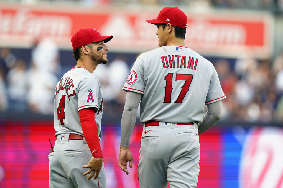 Los Angeles Angels' Andrew Velazquez, left, and Shohei Ohtani, of Japan, right, talk before a baseball game against the New York Yankees Tuesday, May 31, 2022, in New York. (AP Photo/Frank Franklin II)