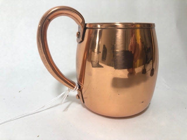 A good polishing makes even pedestrian items like this mug look better than new.