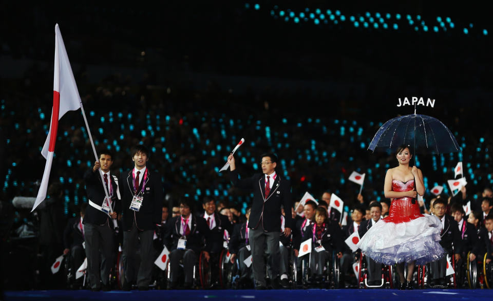 LONDON, ENGLAND - AUGUST 29: Swimmer Keiichi Kimura of Japan carries the flag during the Opening Ceremony of the London 2012 Paralympics at the Olympic Stadium on August 29, 2012 in London, England. (Photo by Clive Rose/Getty Images)