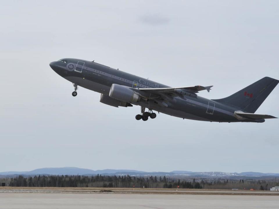 A CC-150 Polaris tanker carrying Canadian Armed Forces members takes off from Bagotville, Quebec on April 29, 2014. (Corporal Jean-Roch Chabot/Department of National Defence - image credit)