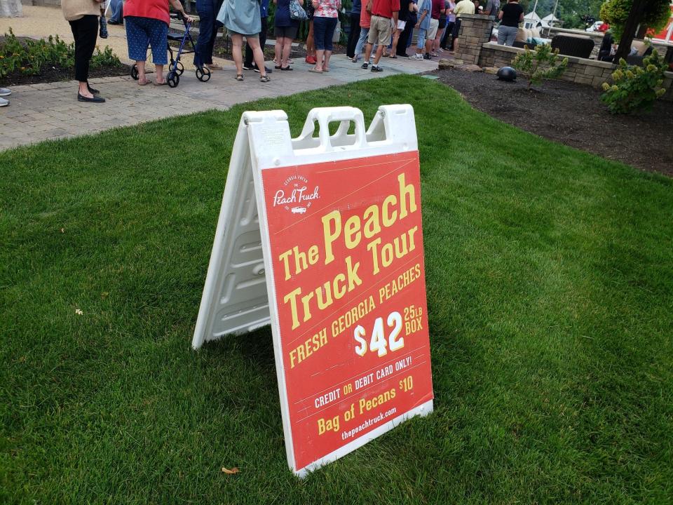 The Peach Truck Tour advertised fresh Georgia peaches for $42 per 25-pound box in 2019 at a stop in Indiana.
(Credit: Chris Sims/IndyStar)