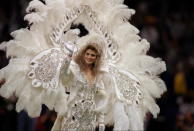 <div class="caption-credit"> Photo by: Getty Images/Al Bello</div>This bedazzled performer brought some Las Vegas realness to the 1997 halftime stage in New Orleans. <br>