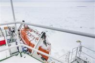 A thin coat of snow covers the deck of the trapped ship MV Akademik Shokalskiy in East Antarctica early December 29, 2013, some 100 nautical miles (185 km) east of French Antarctic station Dumont D'Urville and about 1,500 nautical miles (2,800 km) south of Hobart, Tasmania. REUTERS/Andrew Peacock